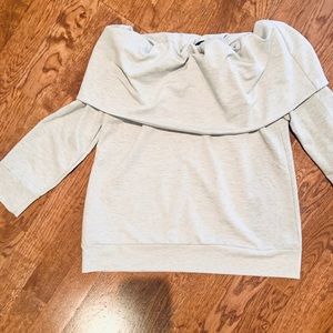 Long sleeve top baby blue color with boat neckline